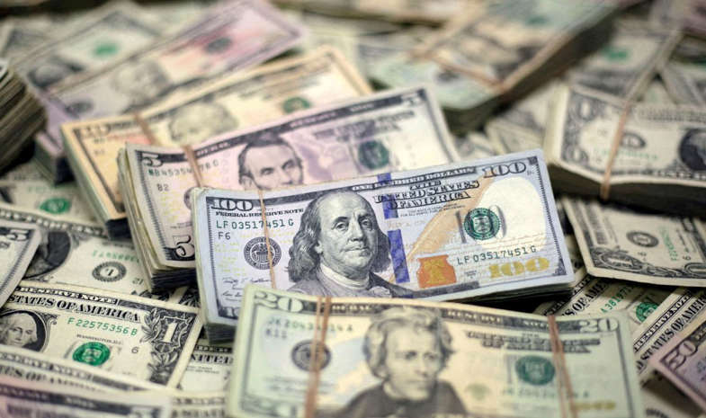 Dólar cai na abertura com decisões de Fed e BC em foco